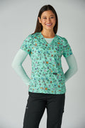 Front view koi Basics Leslie Bird Cage print scrub top