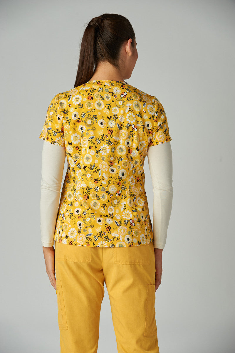 Back view of koi basics Honey Bees women's scrub top.