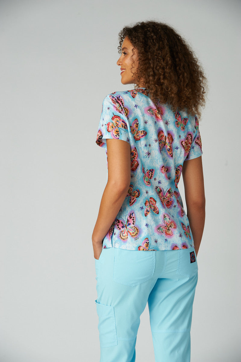 Back view of koi Artist Series Brushstroke Butterfly women's scrub top.