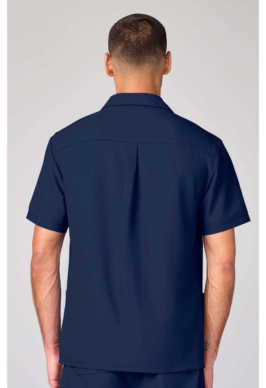 Back view of the Cherokee Workwear Ultra Men's Full Zip Short Sleeve Jacket in color Navy.