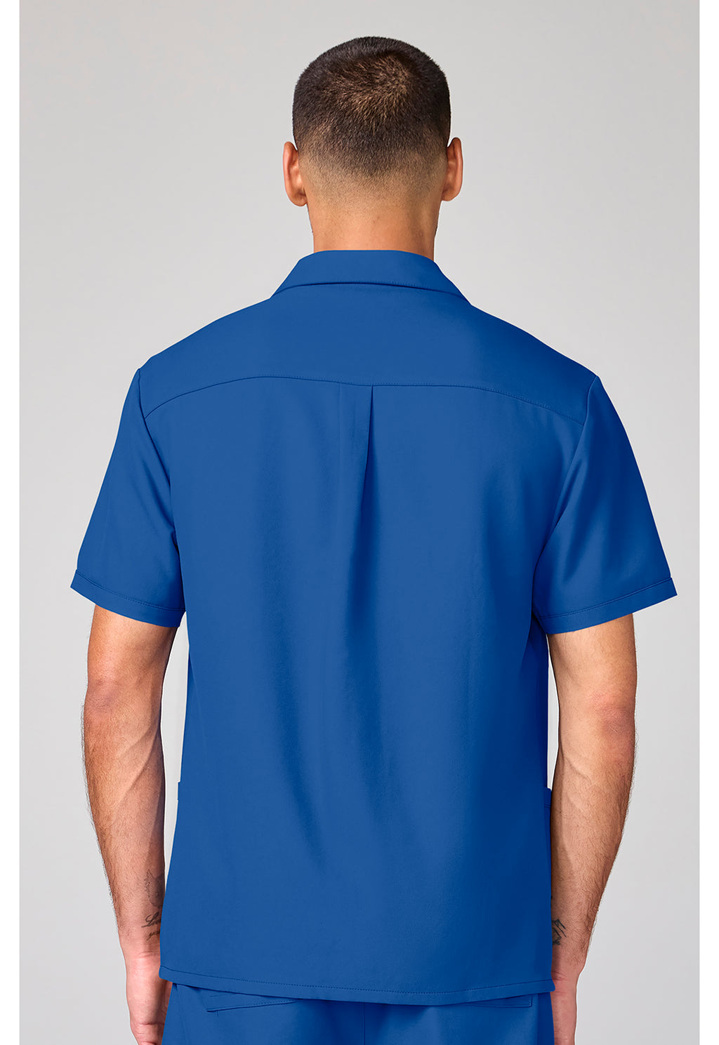 Back view of the Cherokee Workwear Ultra Men's Full Zip Short Sleeve Jacket in color Royal Blue.