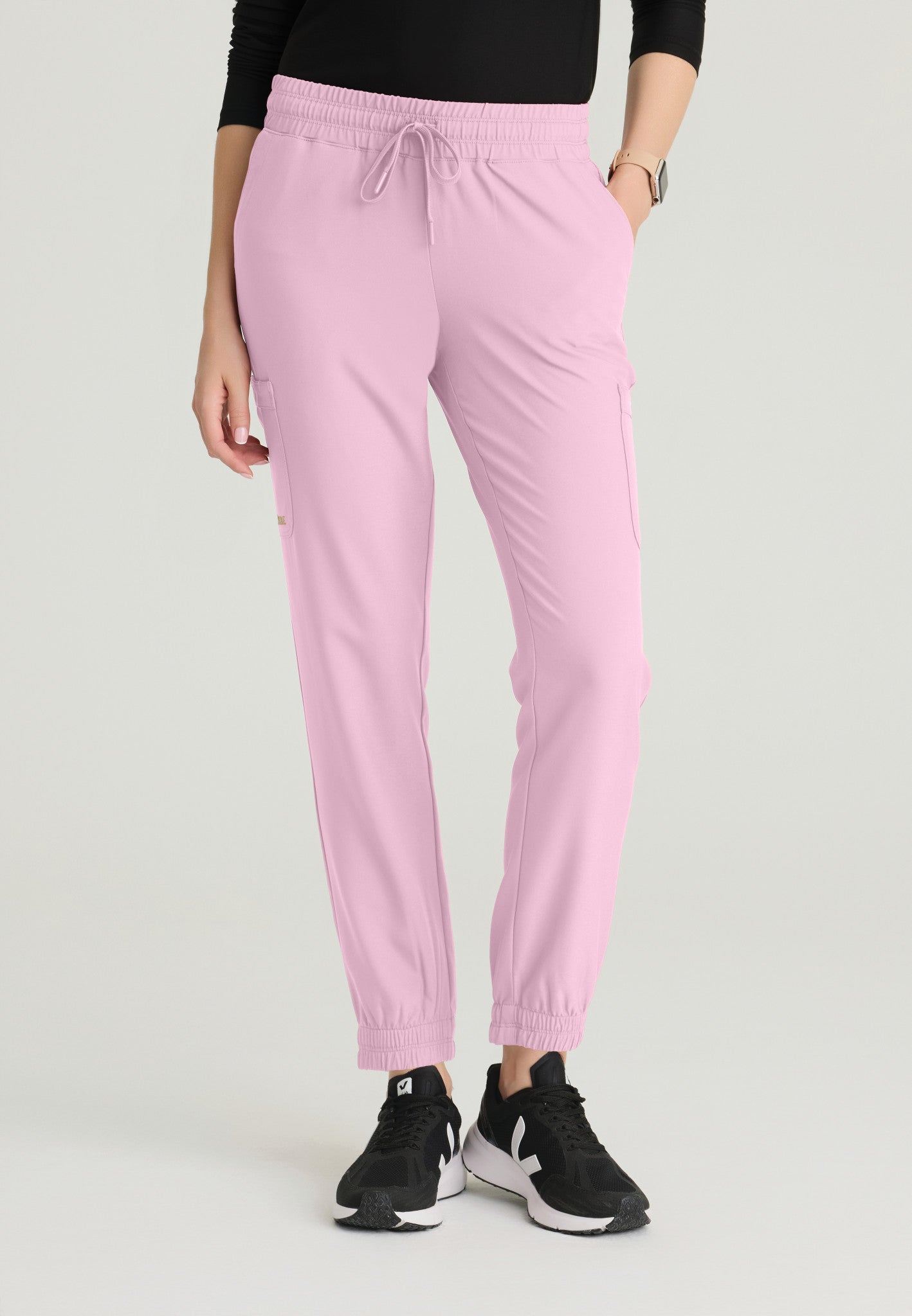 Front view of the Grey's Anatomy Evolve women's Terra scrub jogger in the colour Misty Pink.