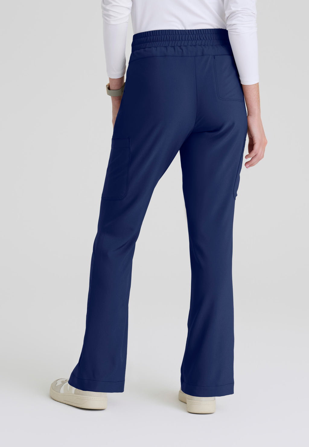 Back view of the Grey's Anatomy Evolve women's Sky scrub pant in the colour Indigo.