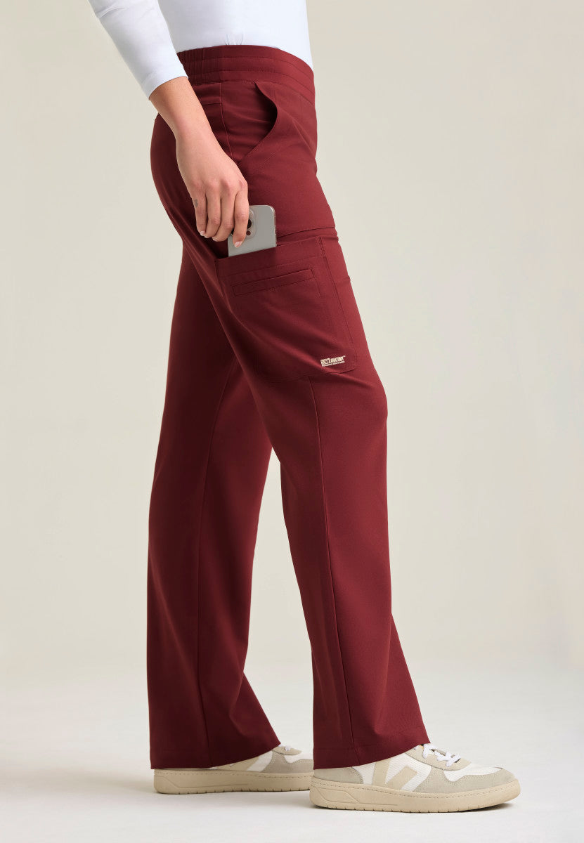 Side view of the Grey's Anatomy Evolve Sky Fit & Flare Scrub Pant | Barco GSSP729 in the color Chestnut.