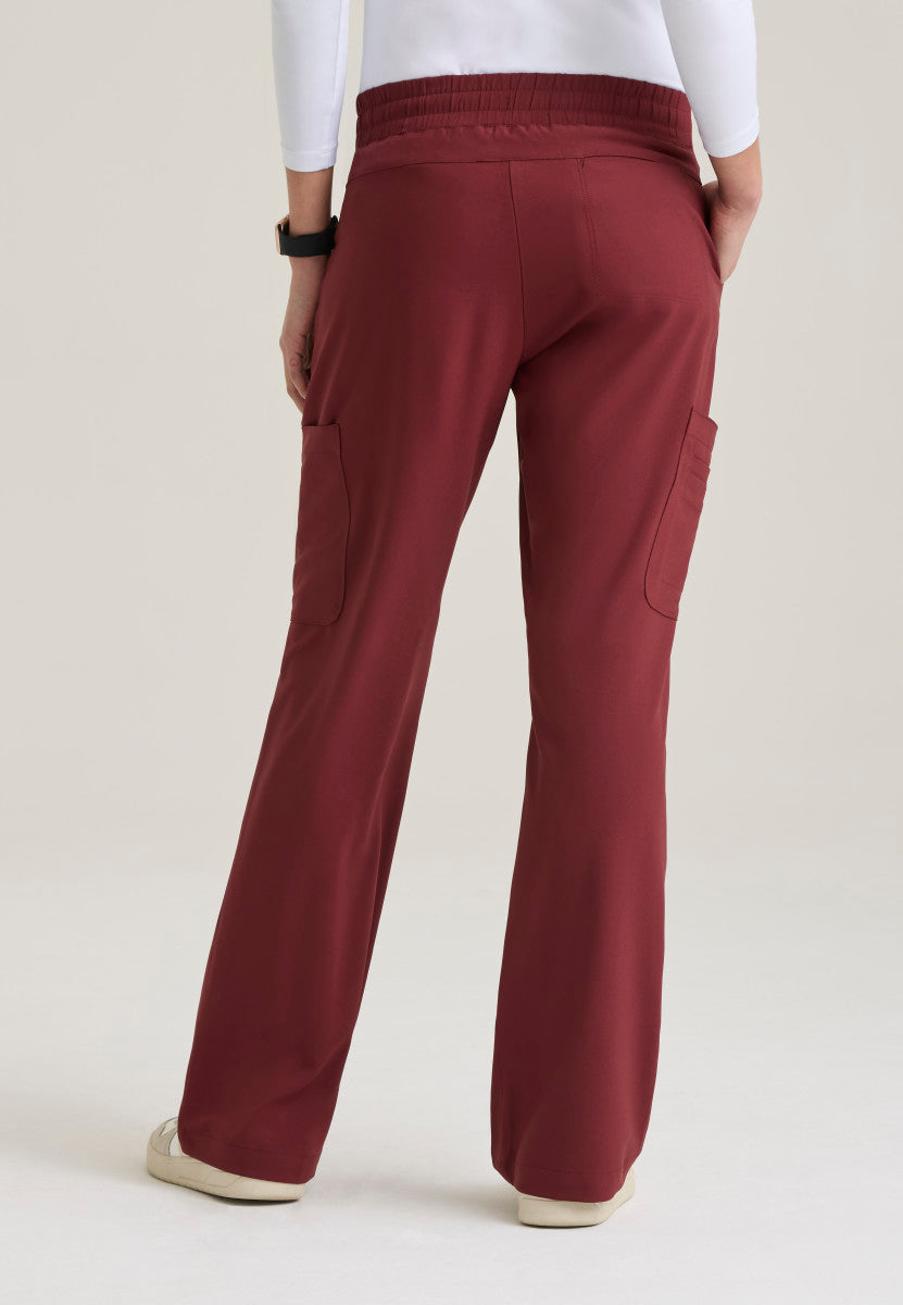 Back view of the Grey's Anatomy Evolve Sky Fit & Flare Scrub Pant | Barco GSSP729 in the color Chestnut.
