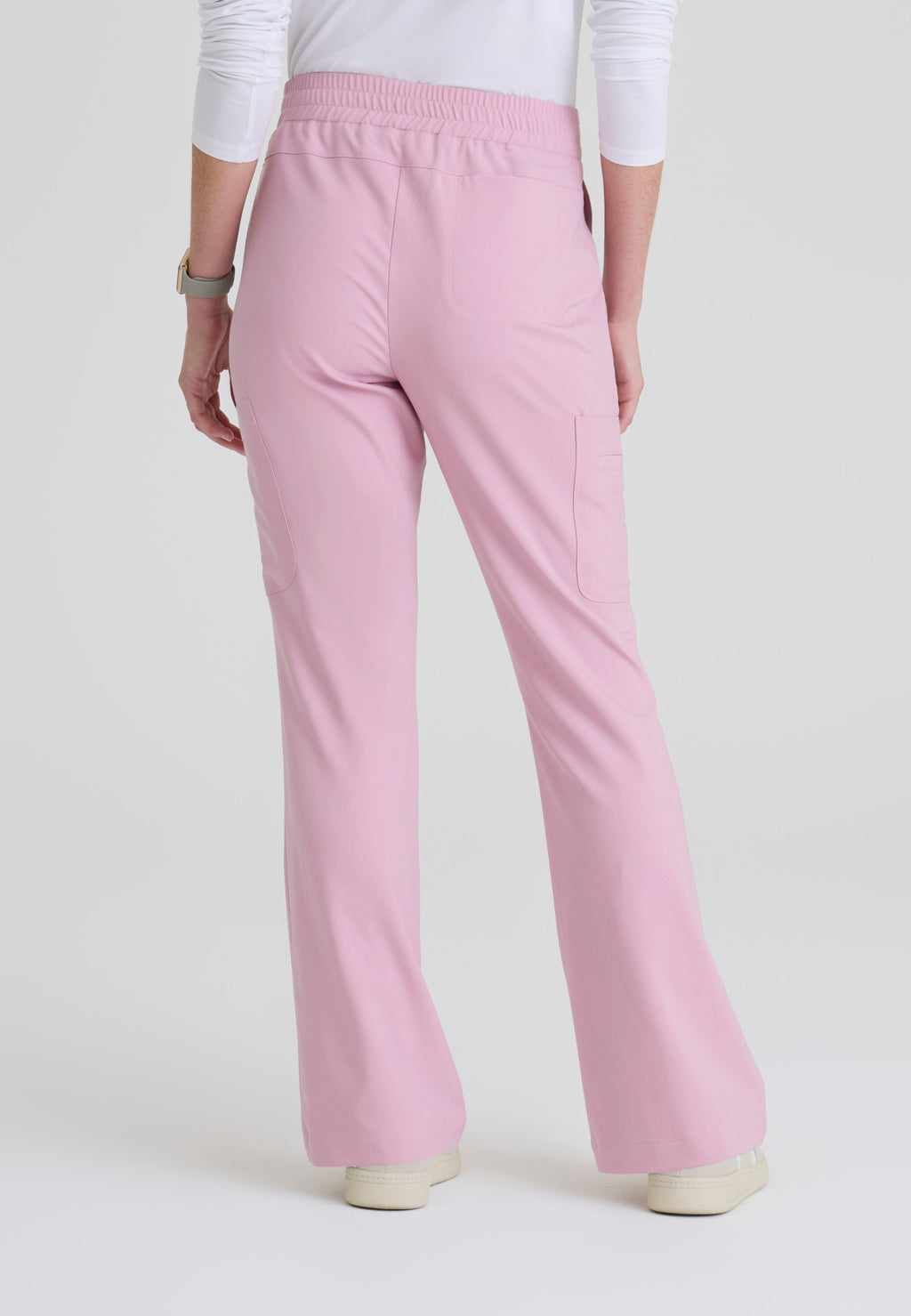 Back view of the Grey's Anatomy Evolve women's Sky scrub pant in the colour Misty Pink.