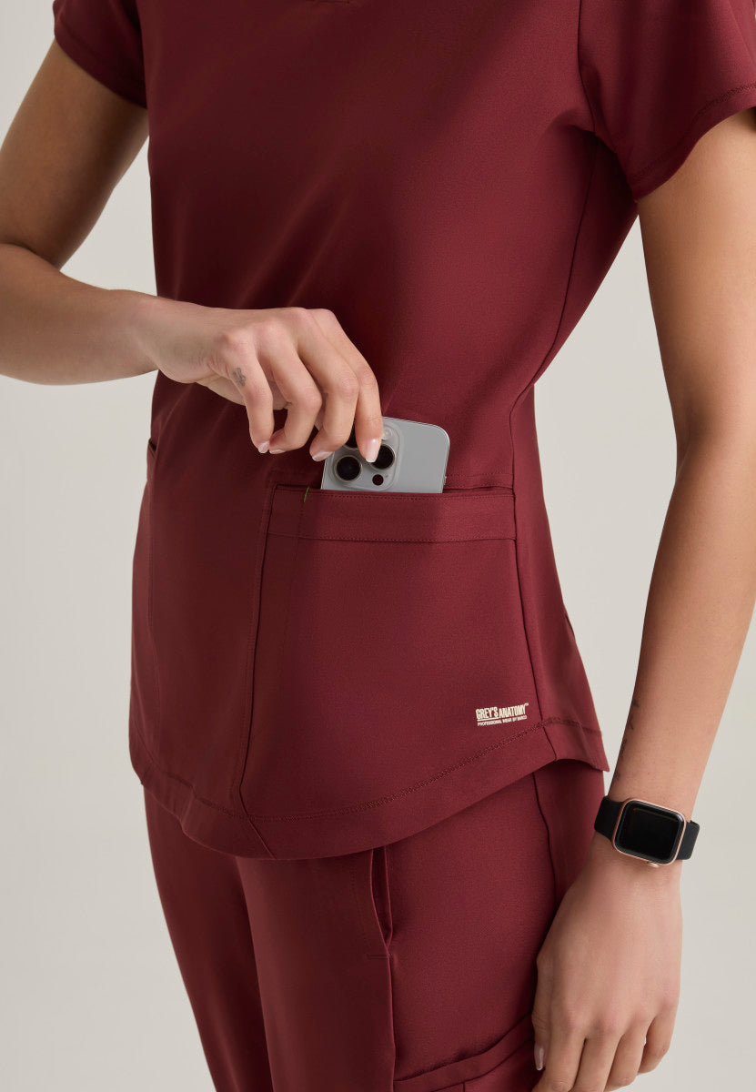 Close up view of the Grey's Anatomy™ by Barco Evolve GSST180 Women's Rhythm Scrub top in the colour Chestnut.