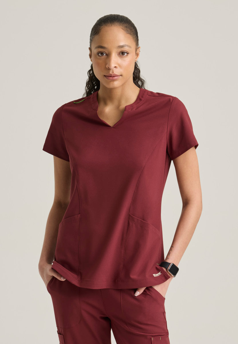 Front view Sky Banded Neckline Scrub Top Grey's Anatomy Evolve GSST298 in the color Chestnut.