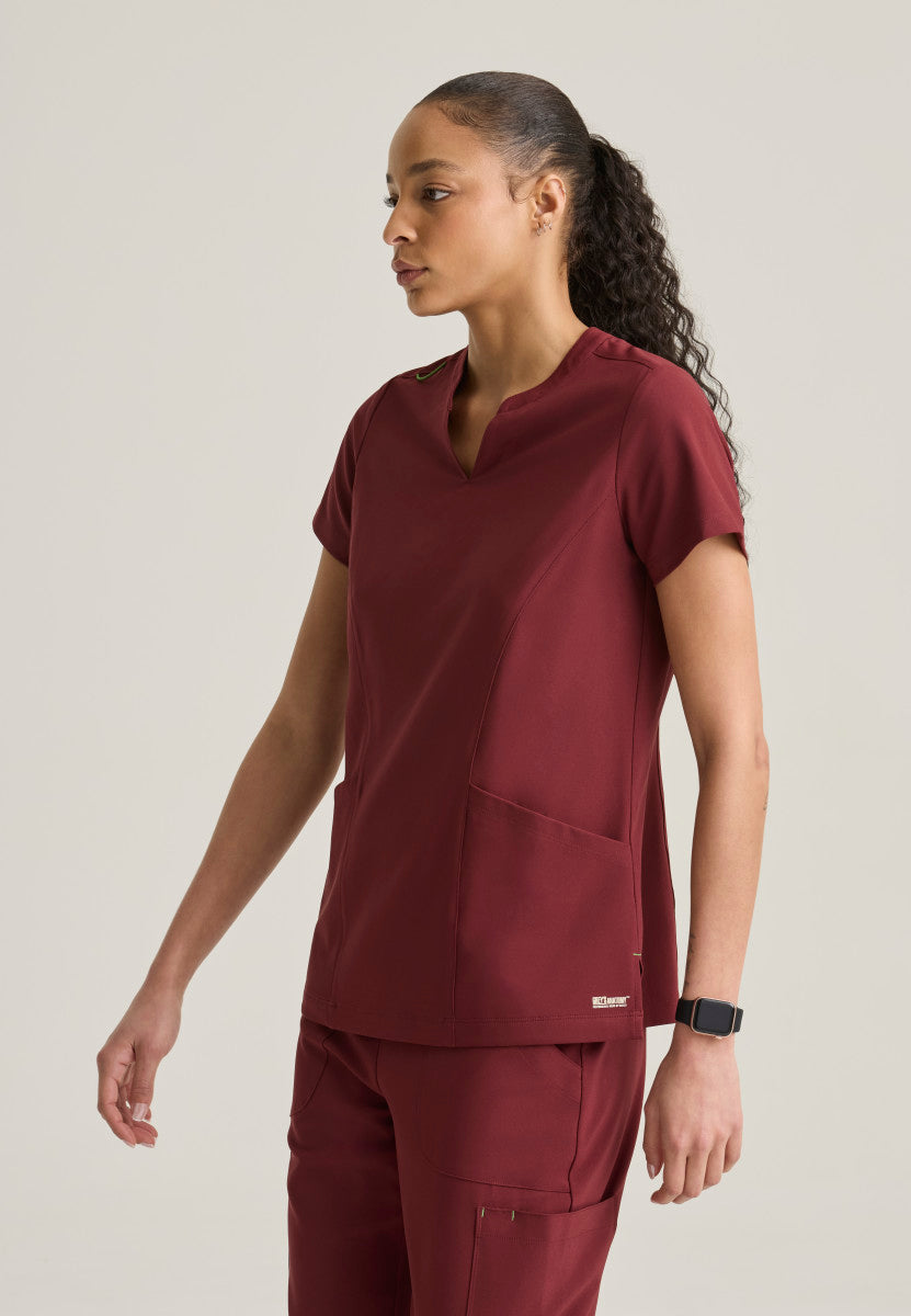 Side view Sky Banded Neckline Scrub Top Grey's Anatomy Evolve GSST298 in the color Chestnut.