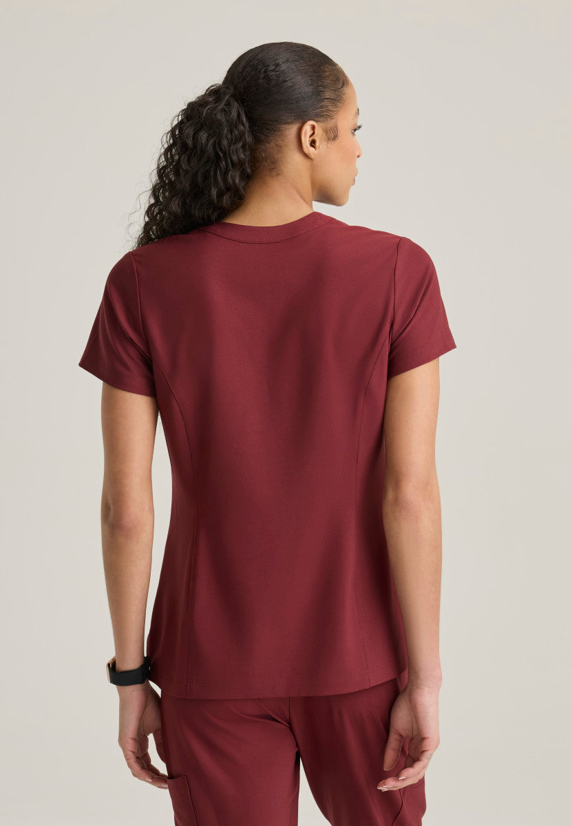 Back view Sky Banded Neckline Scrub Top Grey's Anatomy Evolve GSST298 in the color Chestnut.