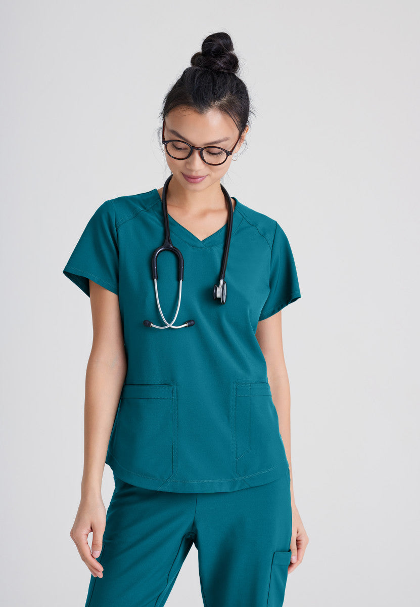 Collège Boréal – Soins infirmiers – Haut d’uniforme Rhythm à 2 poches Women's Scrub Top Grey's Anatomy Evolve Bahama XXS
