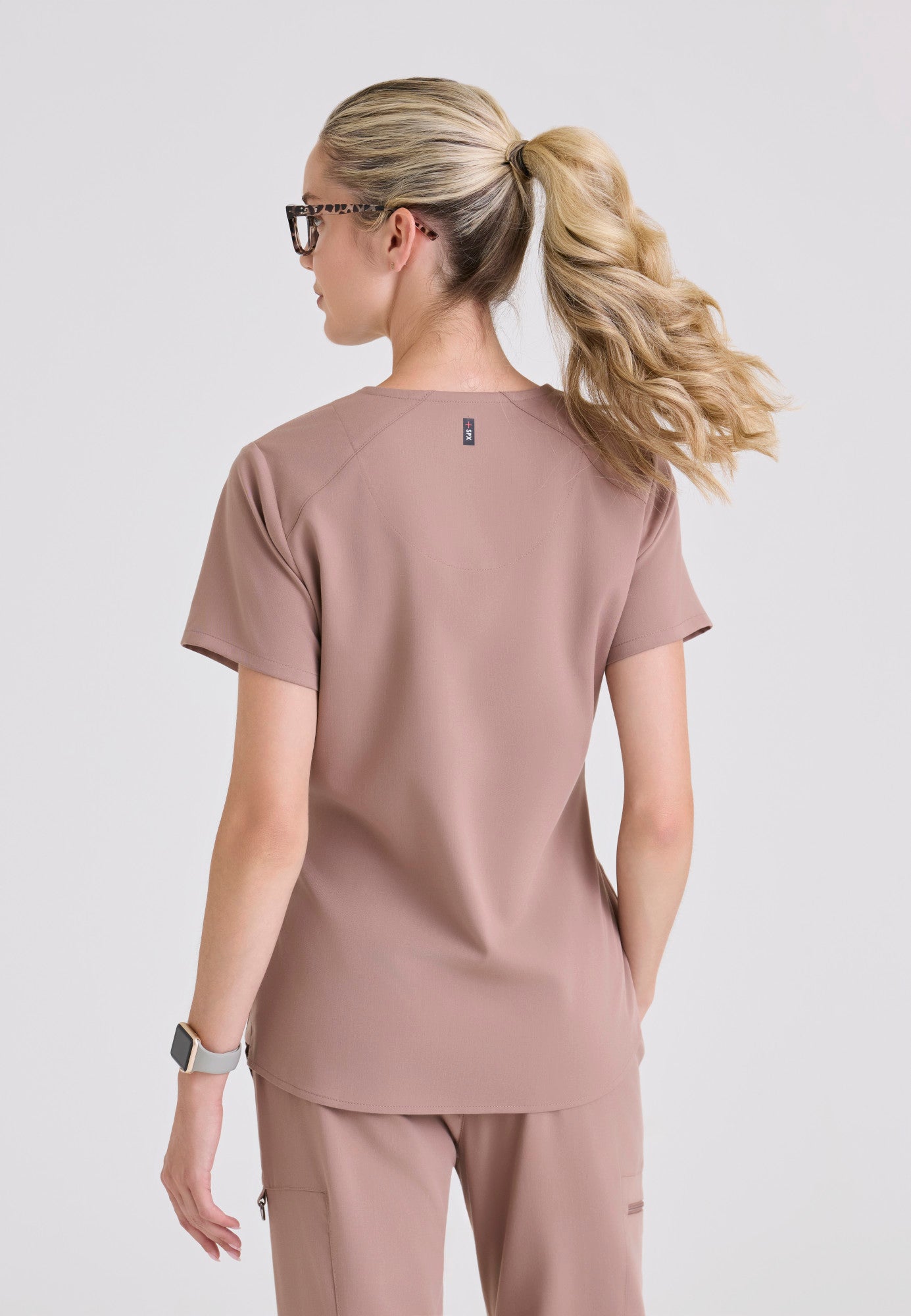 Back view of the Grey's Anatomy Spandex Stretch Emma Scrub top in the colour Warm Mocha.