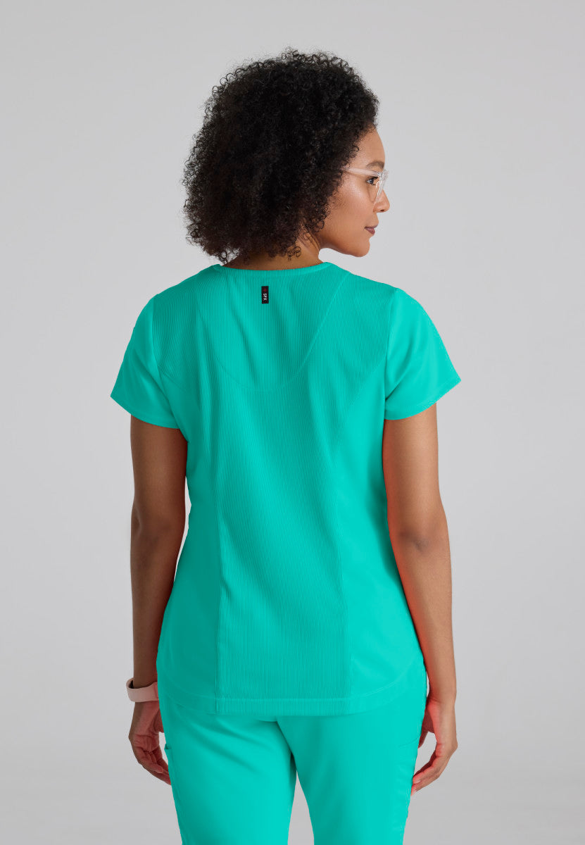 Grey's Anatomy - Haut Capri rentré dans une blouse