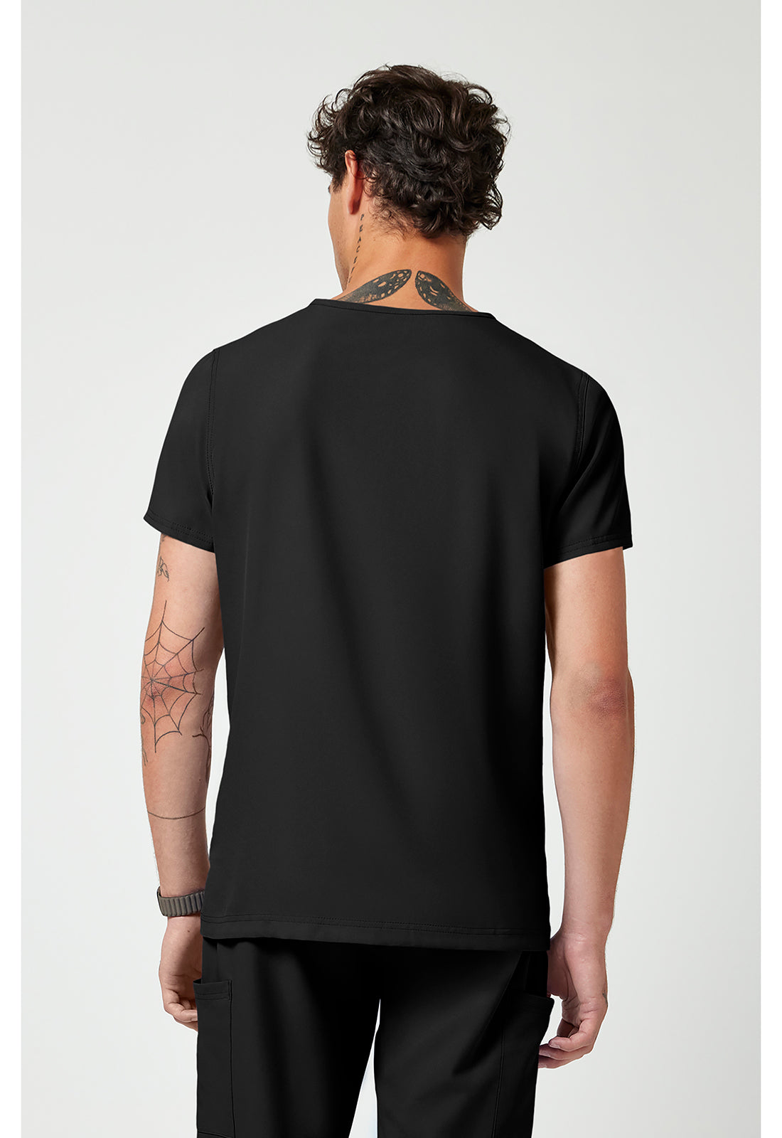 Back view of the Med Couture Rothwear Insight Men's 3-Pocket Scrub Top MC2486 in the colour black.