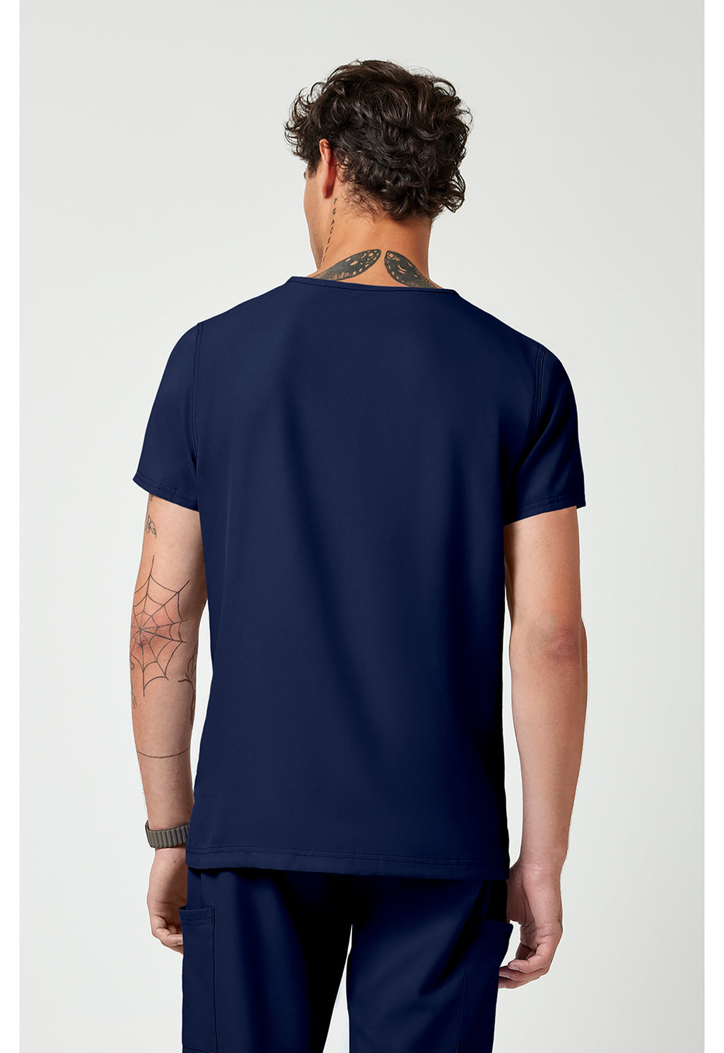 Back view of the Med Couture Rothwear Insight Men's 3-Pocket Scrub Top MC2486 in the colour navy.