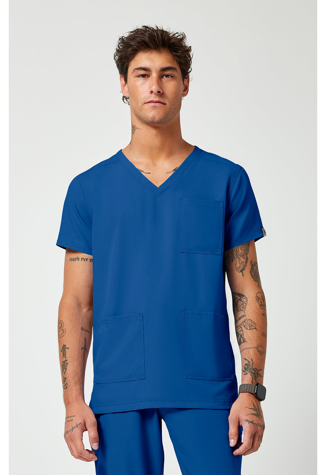 Front view of the Med Couture Rothwear Insight Men's 3-Pocket Scrub Top MC2486 in the colour royal blue.