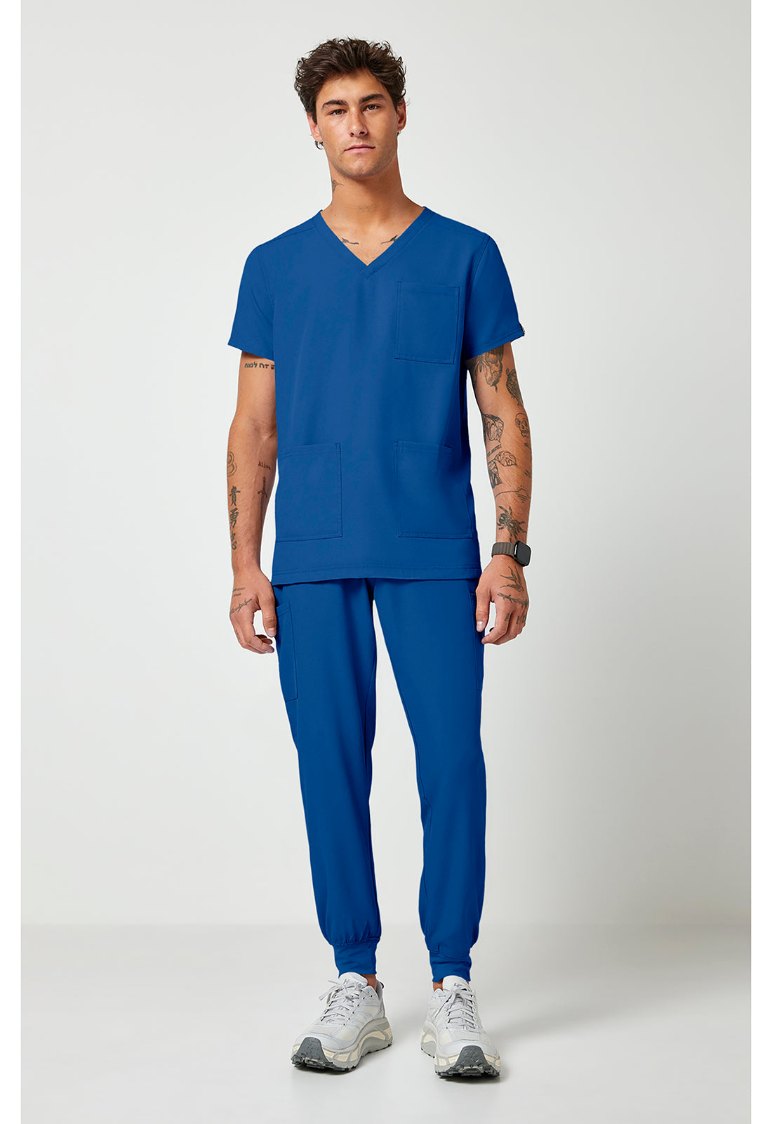 Full view of the Med Couture Rothwear Insight Men's 3-Pocket Scrub Top MC2486 in the colour royal blue.