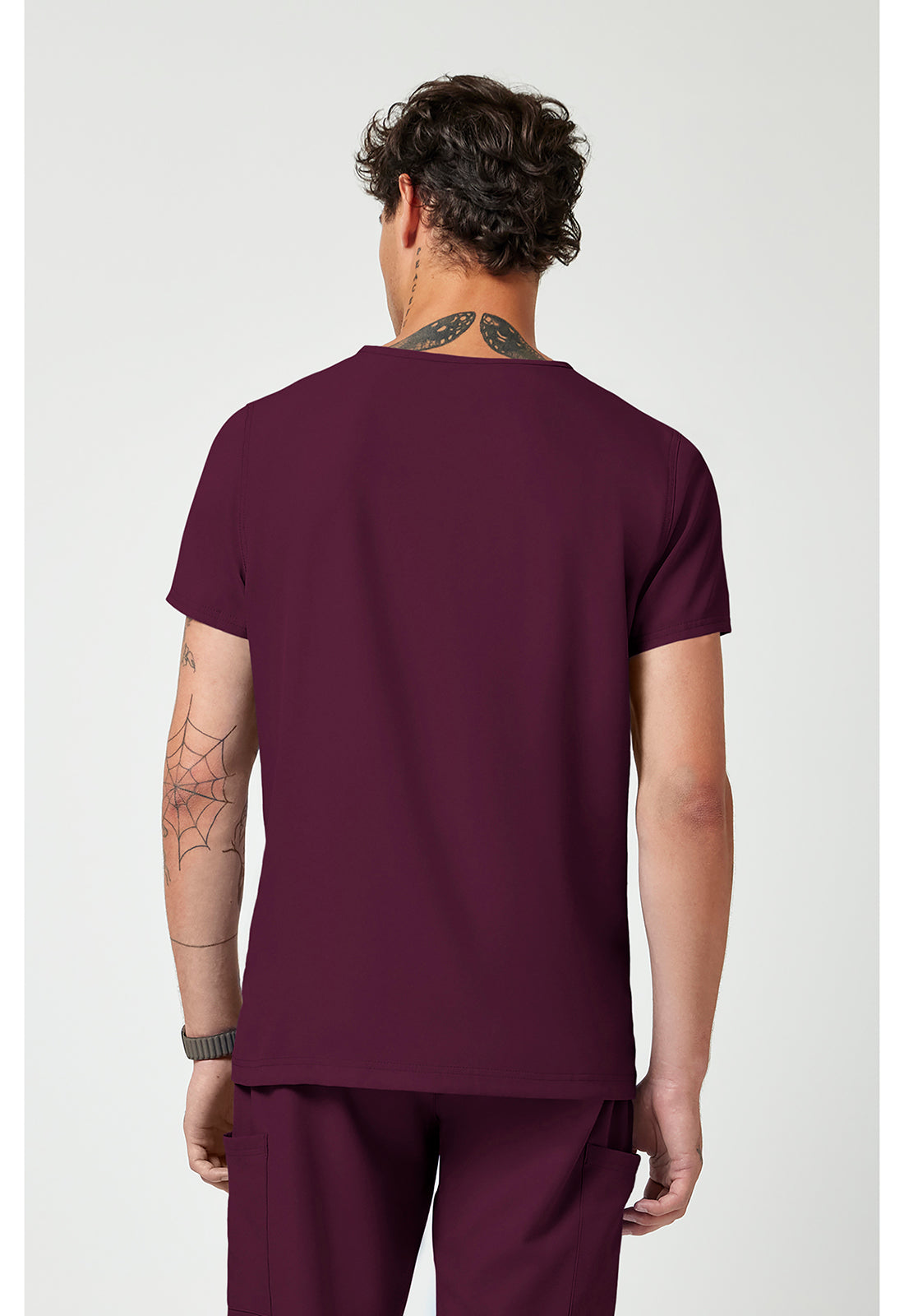 Back view MC2486 Med couture Rothwear Insight Men's Scrub top in colour wine.