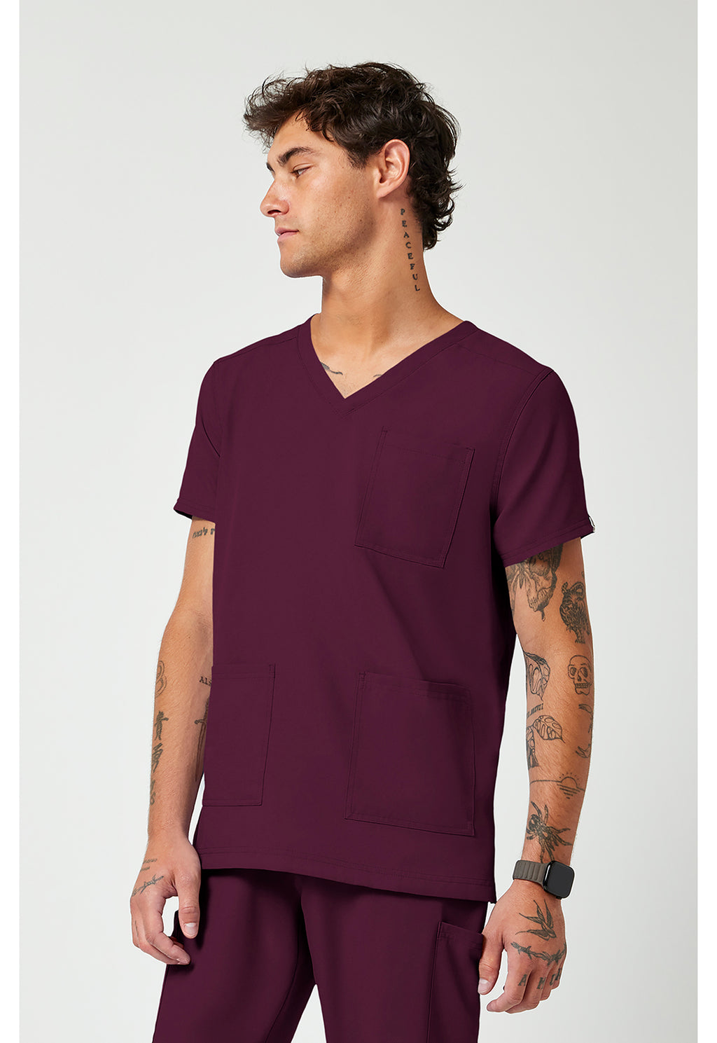 Side view MC2486 Med couture Rothwear Insight Men's Scrub top in colour wine.