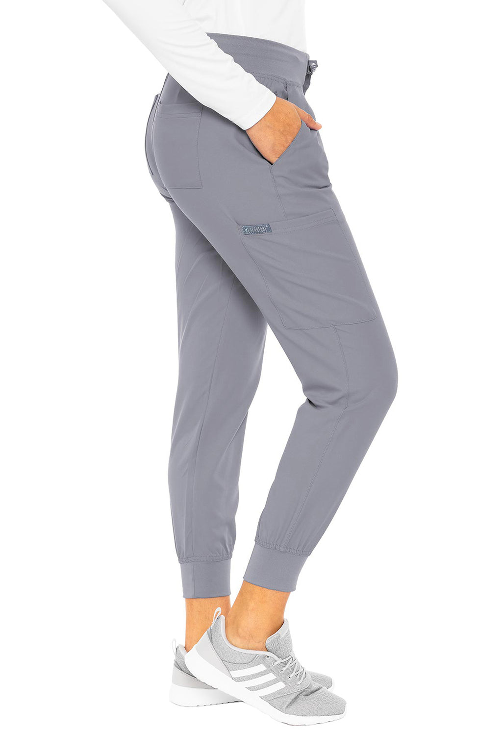 Insight 6-Pocket Scrub Jogger in gray with six pockets and tapered ankle cuffs shown on a model by MED COUTURE Insight for active workwear outfits