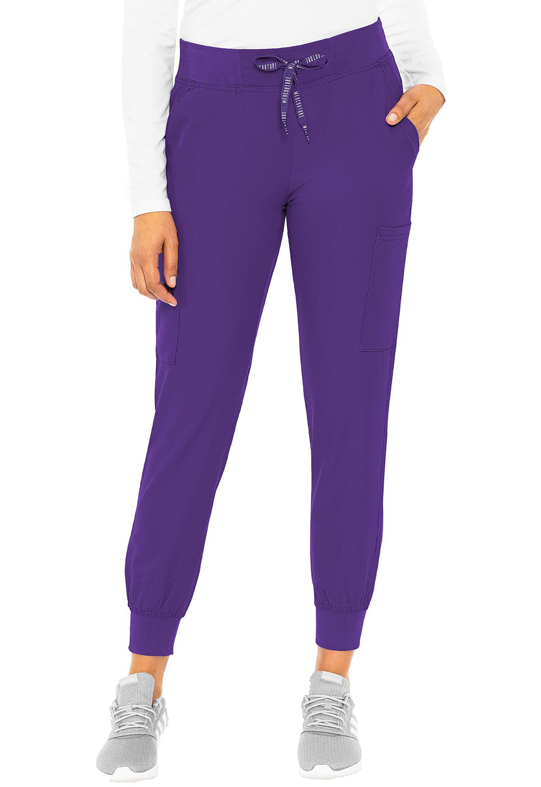 Insight 6-Pocket Scrub Jogger in purple with six pockets and jogger cuffs worn with sneakers by MED COUTURE Insight