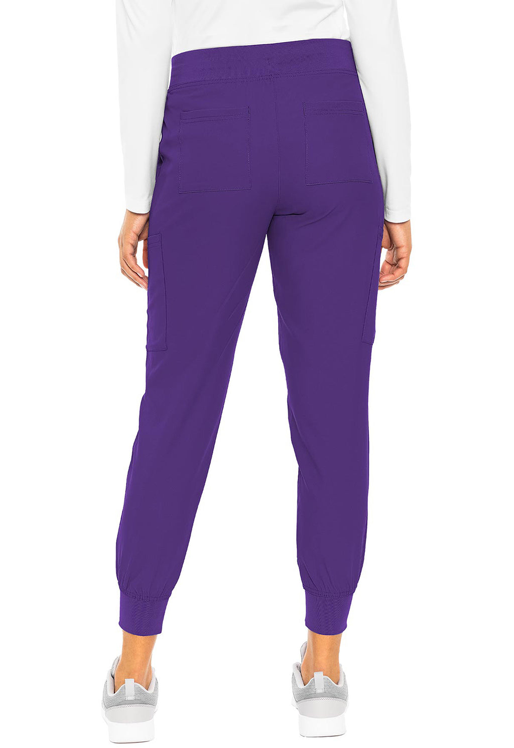 Insight 6-Pocket Scrub Jogger in purple shown from the back on a model with elastic cuffs by MED COUTURE Insight