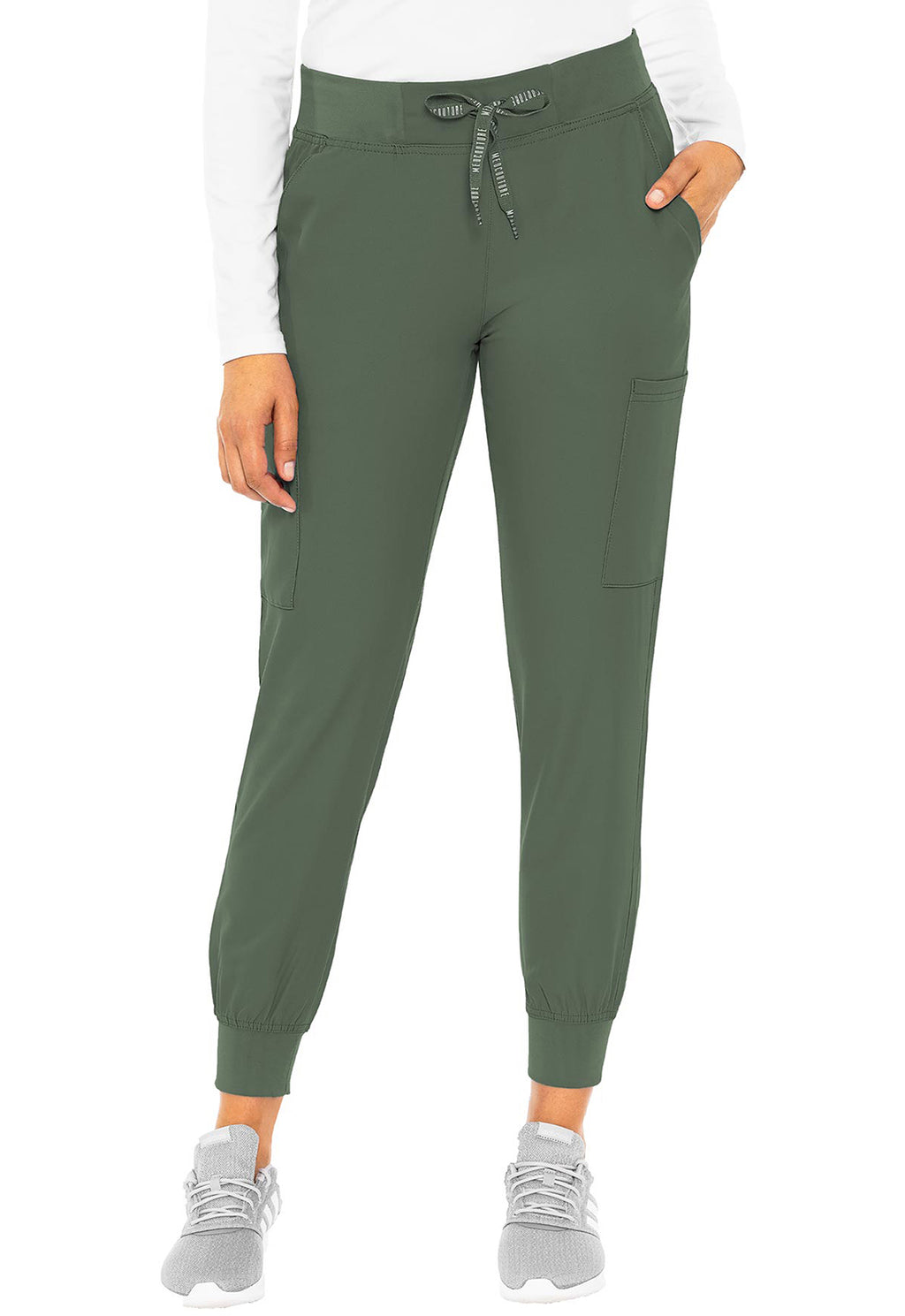 Insight 6-Pocket Scrub Jogger in olive green shown on a model with six pockets drawstring waist and tapered cuffs. MED COUTURE Insight scrub workwear.