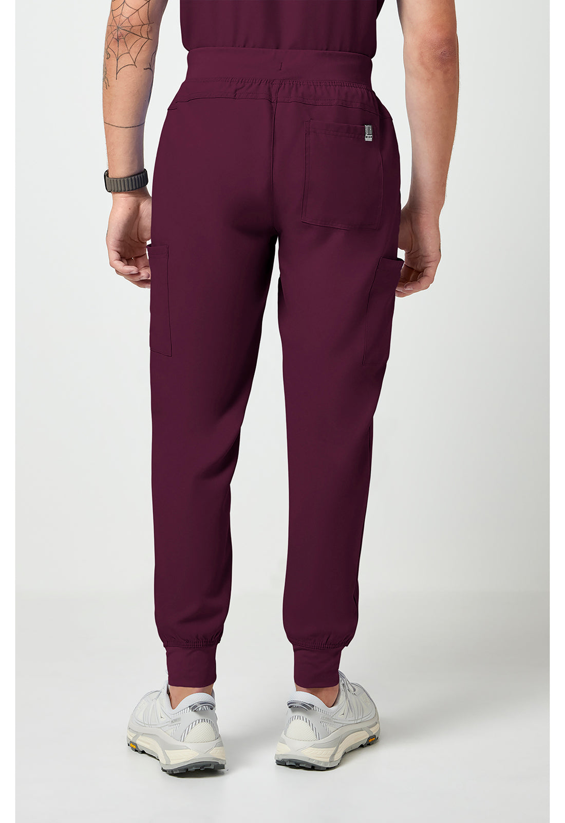 Back view of MC Rothwear Insight Men's Jogger Scrub Pants in the colour wine.