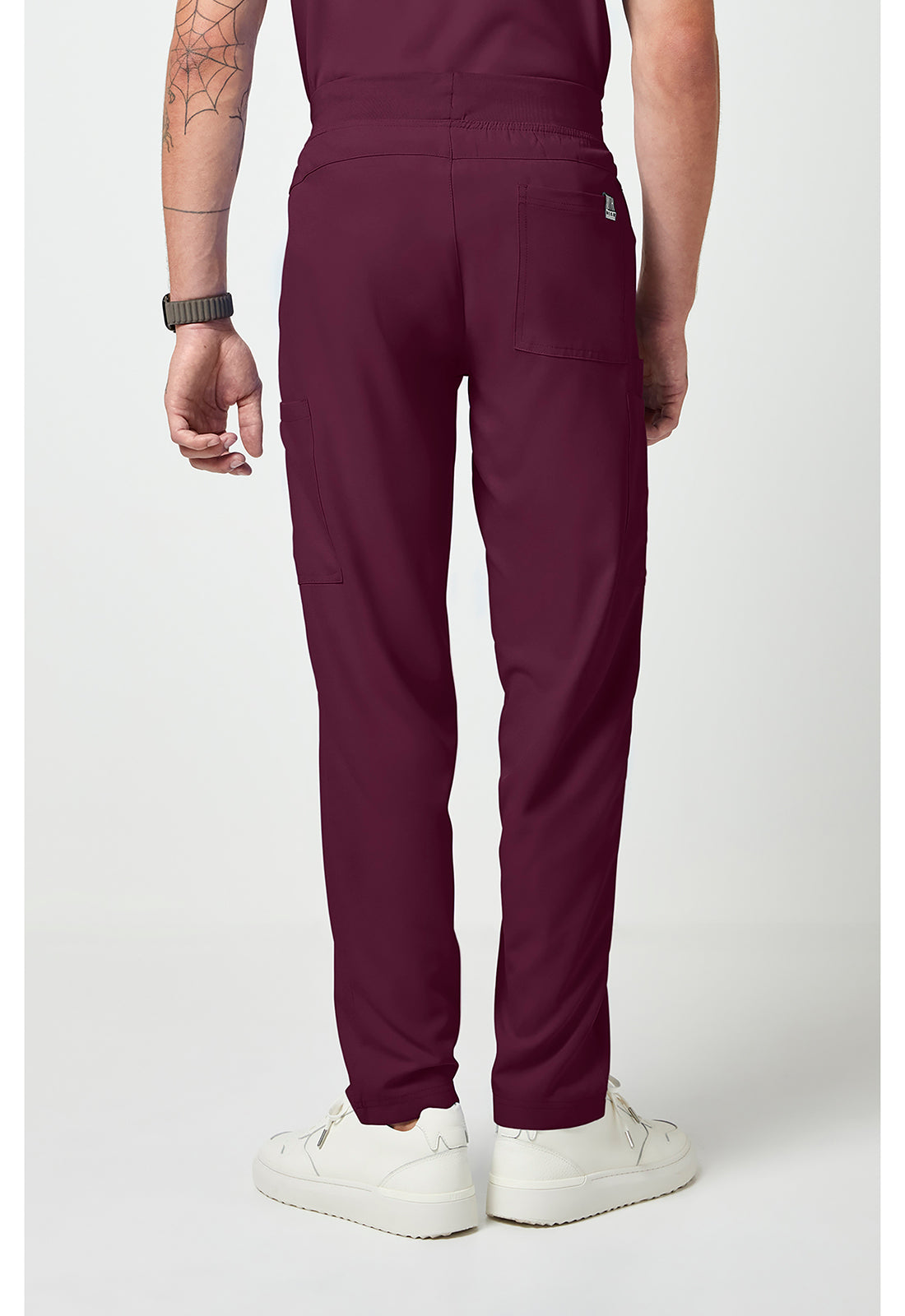 Back View Med Couture Rothwear Insight Men's scrub pant in the colour wine.