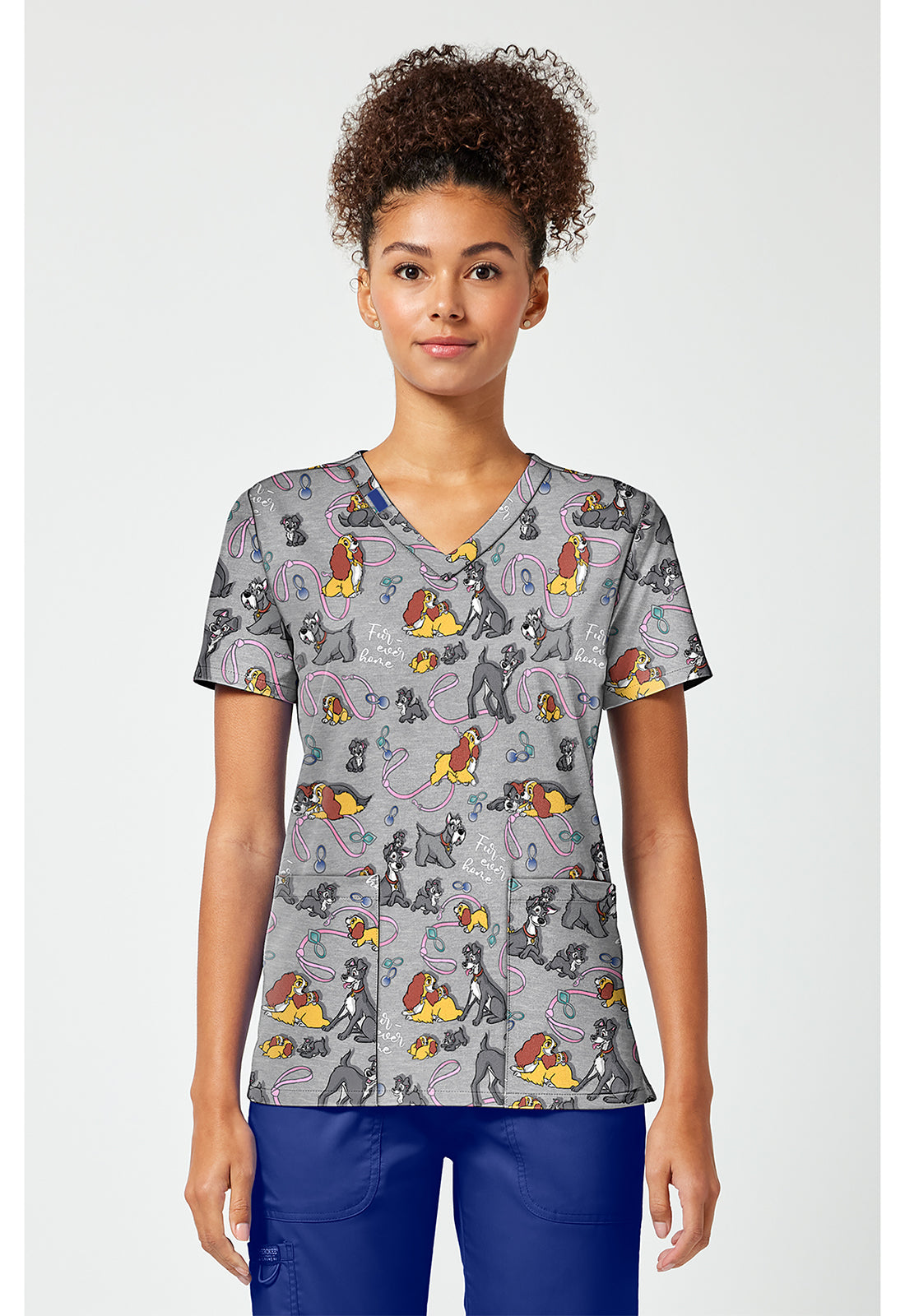 Front view of the Tooniforms Disney Lady and the Tramp Print Scrub Top