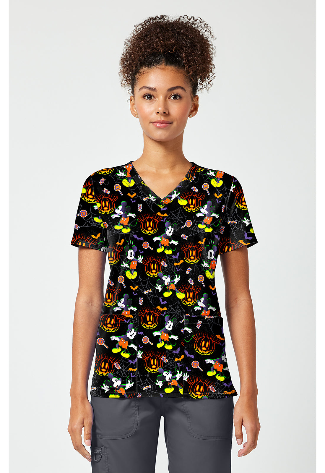 Front view of the Mickey Mouse Spooky Webs Scrub Top