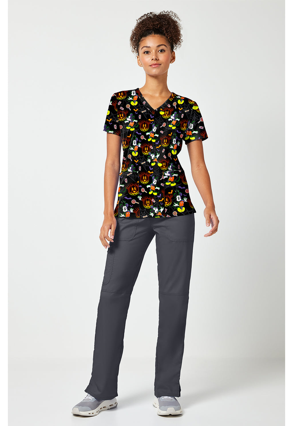 Full view of the Mickey Mouse Spooky Webs Scrub Top