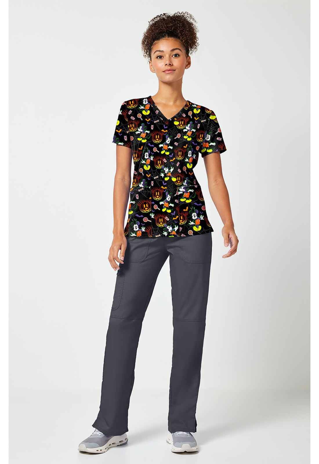 Full view of the Mickey Mouse Spooky Webs Scrub Top