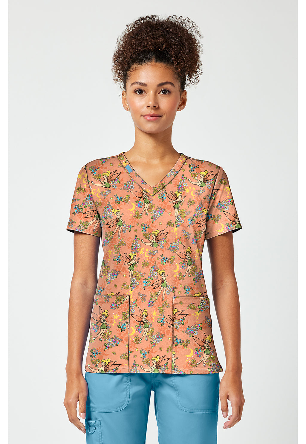 Front view of the Tinkerbell Pixie Petals Scrub Top