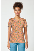 Front view of the Tinkerbell Pixie Petals Scrub Top