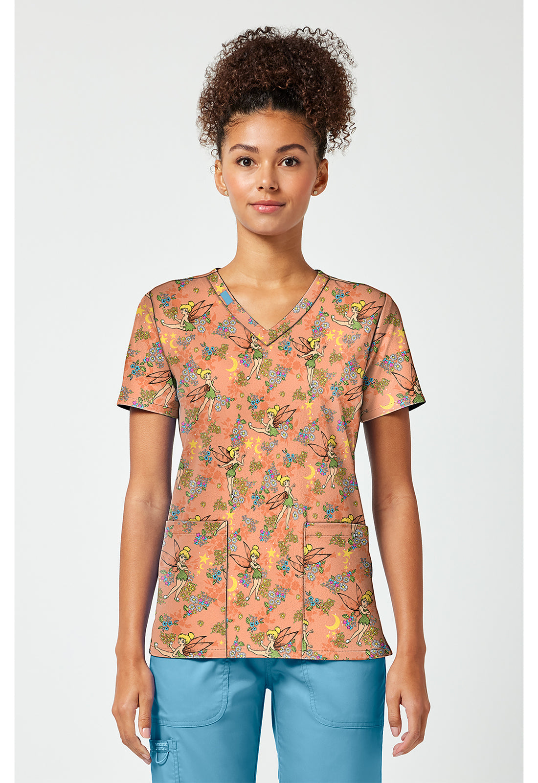 Front view of the Tinkerbell Pixie Petals Scrub Top