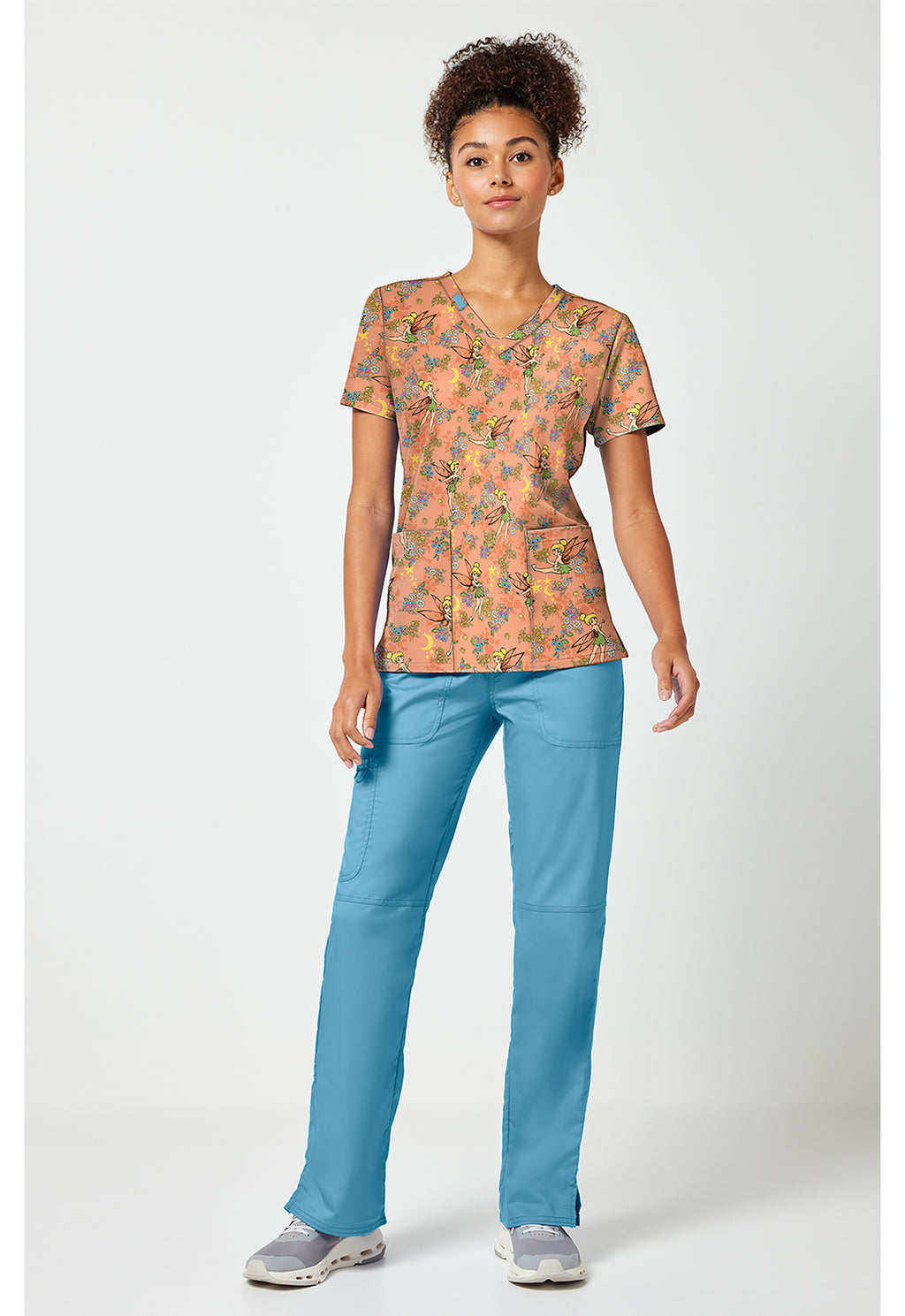 Full view of the Tinkerbell Pixie Petals Scrub Top