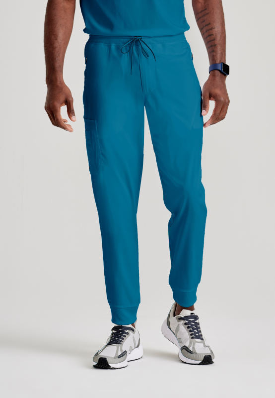 Grey's Anatomy Murphy Pant - Zip-Fly 5-Pocket Jogger Scrub Pant Men's Scrub Jogger Grey's Anatomy Spandex Stretch Caribbean Blue XS 