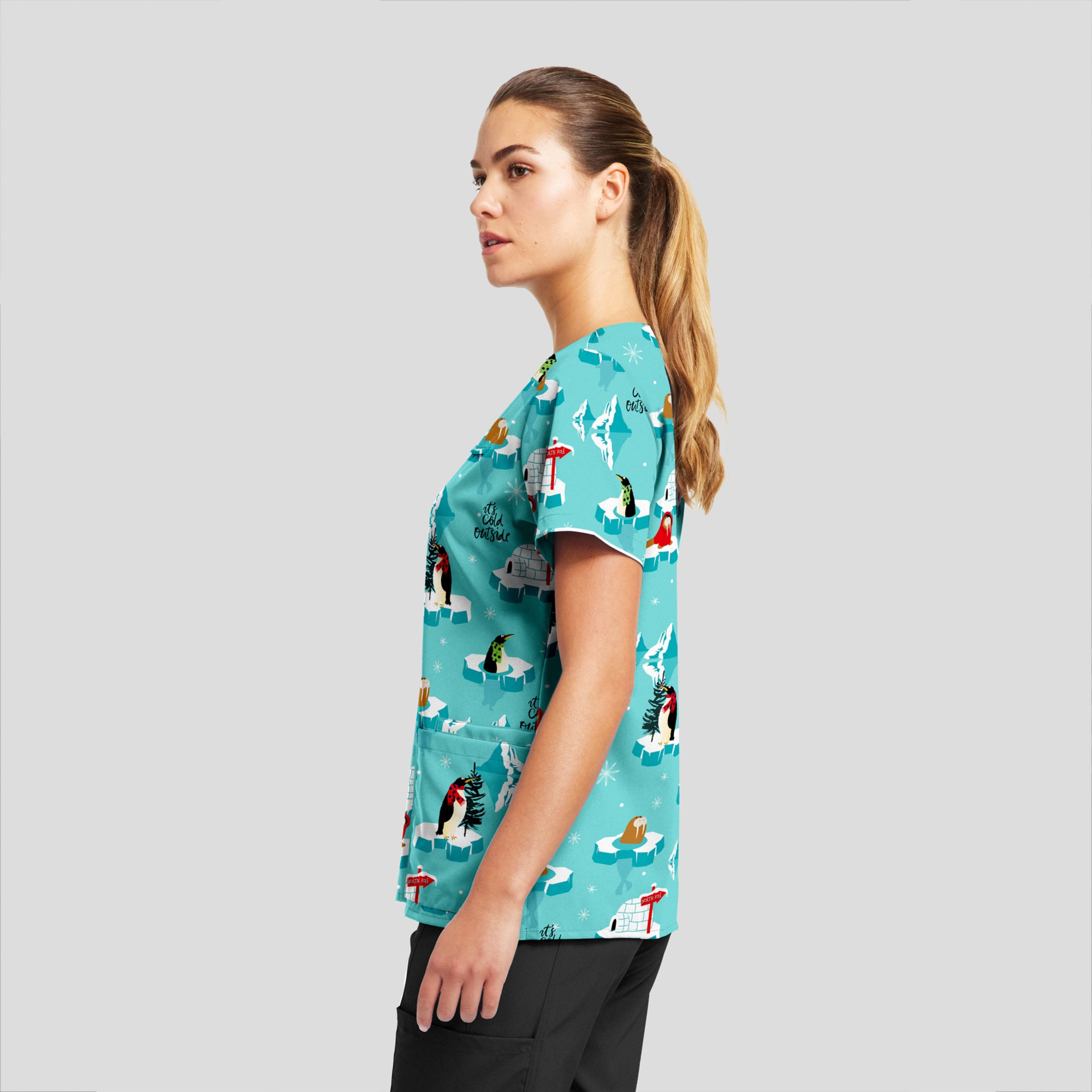 Penguins On Ice Holiday Scrub Top Women's Holiday Print Scrub Top White Cross